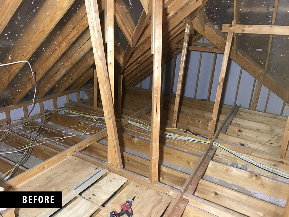 a picture of an attic before it has the attic lift installed.