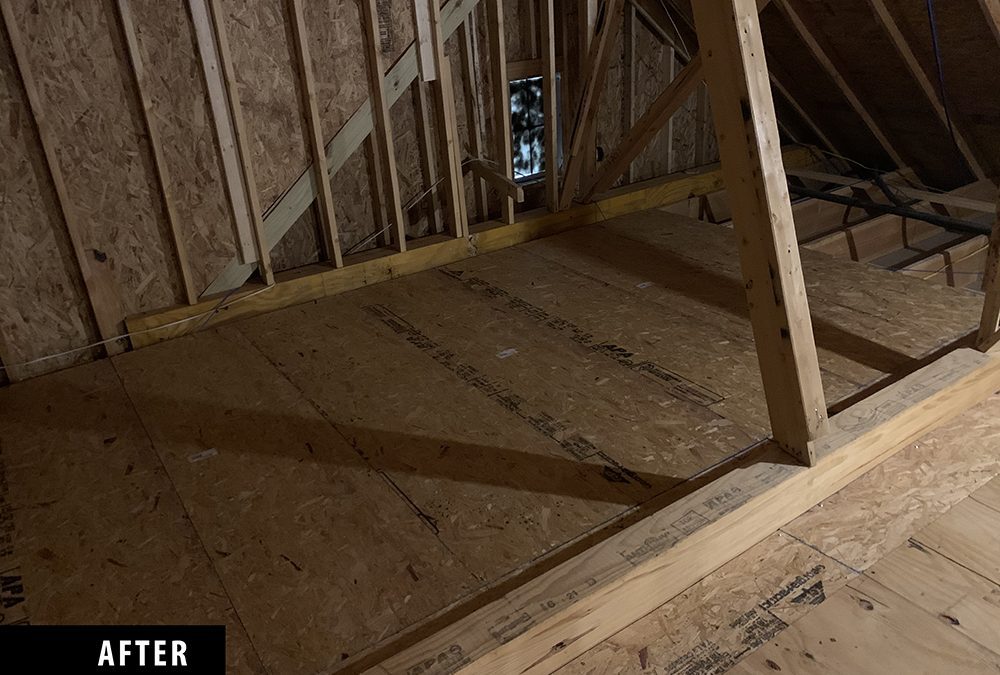 An attic space after installing flooring.