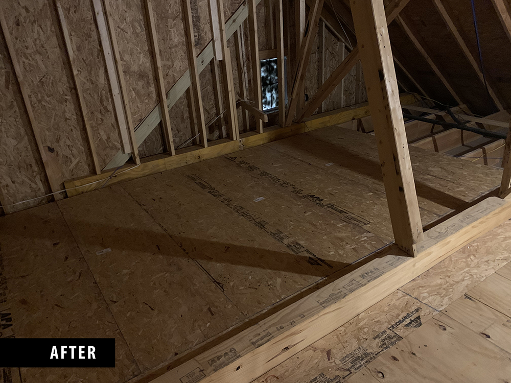 An attic space after installing flooring.